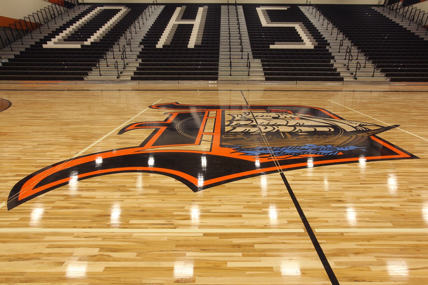 A.C. Davis High School basketball court featuring the Pirates logo at center court